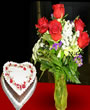 One France's Heart shape white forest cake and 1 dozon Red Rose with 3 Rojonigondha Flower. 